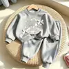 Nuevo conjunto de comercio exterior para niñas: Sudadera con pajarita y pantalones de chándal, conjunto versátil y elegante de dos piezas para niños pequeños y niños pequeños