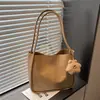 Bolsa de mão retrô de alta qualidade e grande capacidade para mulheres, novo design casual e minimalista de 2026, adequada para o dia a dia, bolsa de ombro e bolsa tote