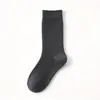 Meias de Lã Femininas Outono e Inverno Meia de Cano Médio Forradas com Fleece Espessadas Quentes de Inverno Meias de Caxemira Pilhas de Meias Indústria de Meias Zhuji
