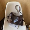 Bolso de Axila de Diseño Nicho Chic Estilo Coreano para Mujer Nuevo Nuevo Retro Versátil Simple para Viajar Bolso de Hombro Único Cruzado