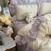 Estilo ins, fresco y simple, juego de ropa de cama de cuatro piezas de algodón puro, diseño de princesa estilo coreano, algodón lavado, estampado floral, ribete floral grande, juego de tres piezas apto para estudiantes