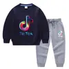 Conjunto de Roupas Infantis Transfronteiriças Novo Primavera e Outono de 2026: Conjunto de Duas Peças com Moletom e Calça Comprida para Crianças, Conjunto de Algodão de Manga Longa Cor Sólida para Bebês