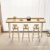Mesa alta de bar de ocio nórdica para uso doméstico en Yangtai, mesa larga simple de madera maciza para colocar en la pared o junto a la ventana, juego de mesa y sillas con patas altas