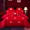 Juego de ropa de cama de lujo estilo chino, hecho de algodón 100% de fibra larga, un juego de cuatro piezas que incluye una sábana y una funda de edredón de algodón puro rojo, perfecto para la alcoba de una recién casada.
