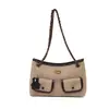 Bolso retro de ante a la moda 2026 nuevo bolso cruzado versátil para mujer con un toque de alta gama para ir al trabajo, bolso de hombro único bajo el brazo