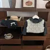 Conjunto de ropa de otoño para niñas timo 2026 nuevo estilo niños bebé chaleco de punto elegante capa base pantalones de pierna ancha tres piezas