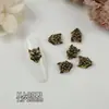 Ventas Directas de Fábrica de Nuevos Pedrería Retro Cruzada para Uñas de Moda al Por Mayor, Decoraciones para Uñas con Forma de Corazón y Cabeza de León