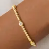 Pulsera Cruzada Chapada en Cobre 14K para Exportación Europea y Americana, Nuevo Estilo de Moda, Pulsera Personalizada Sencilla Casual con Cuentas Doradas y Cordón Elástico