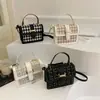 La popular bolsa pequeña de este año para mujer 2024 Nuevo estilo coreano de moda ins nicho bandolera pata de gallo portátil bolsa cuadrada pequeña