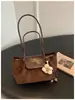 Bolso pequeño vintage de alta calidad para mujer, nuevo modelo de moda 2026, bolso versátil de hombro o axila, bolso de mano tote para el día a día