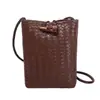 Moda de verano 2026 transfronteriza mini bolsa suave tejida versátil bolsa para teléfono para mujer bolso pequeño de hombro cruzado