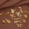 Acero inoxidable europeo y americano zorro delfín nota granada guitarra tiburón guantes animal colgante individual acero de titanio chapado en oro de 24 quilates