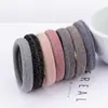 5cm explosiones de comercio exterior anillo para el pelo de seda brillante alta elasticidad alta calidad color liso base cuerda para el pelo de dama cubierta de cuero fabricantes venta al por mayor