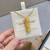 Tienda de Oro Mismo Estilo Portátil Buda de Oro Cobre Chapado en Oro Buda del Nacimiento Colgante Mantra de Seis Caracteres Bodhisattva Oculto en el Vacío Santo Patrón Collar