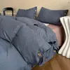 Nuevo conjunto de cuatro piezas de algodón y lino estilo botón simple de lujo ligero, estilo minimalista de Instagram, conjunto de tres piezas de hilo de rizo de algodón puro para ventas transfronterizas
