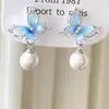 Nuevos Pendientes Exquisitos para Mujer, Pendientes de Borla de Cristal Perla Mariposa, Diseño de Alta Gama, Joyería de Oreja Moderna y Versátil