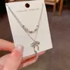 Moda Estilo Coreano y Japonés Lujo Ligero Versátil Doble Capa Cinta de Cuentas Lazo Collar Cadena para el Cuello Simple Exquisito