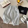 Pantalones de chándal para niños 2026 nueva colección de otoño para niños pantalones largos de punto versátiles pantalones deportivos casuales de dibujos animados para primavera y otoño