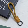 Nuevo Cordón para Teléfono Móvil de Cuero PU Empalmado de Huayang, Cordón para Teléfono Móvil de Cuerda Trenzada Colorida, Correa para Botella de Agua con Llavero