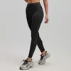 Procesamiento y Personalización en Fábrica de Origen de Leggings Deportivos de Yoga Color Durazno, con Pruebas de Imagen, Aplicación de Etiquetas y Selección de Color