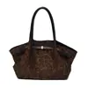 Bolso tote de axila con estampado de leopardo y pliegues retro para mujer, nueva colección otoño 2026, bolso de mano de moda niche, bolso de hombro para el día a día