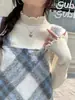 Otoño e invierno nueva moda ajuste ceñido ajustado manga larga top de punto básico versátil cuello semi-alto suéter interior mujer