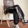 Pantalones Casuales para Hombre Transfronterizos Sueltos de Marca de Moda Pantalones Largos Estampados para Hombre Juventud Estilo Hong Kong Modernos Pantalones Versátiles Estilo Chino