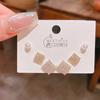 Verano nuevo chapado en oro real exquisitos tres pares de aretes pequeños de alto sentido pequeños frescos dulces aretes de temperamento combinables