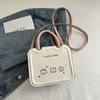 Bolso Pequeño de Nicho para Mujer 2025 Primavera y Verano Nuevo Bolso Pequeño Cruzado para Mujer de Alto Valor con Texto Diseño Bolso Galleta de Mano