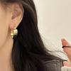 Hermosos pendientes huecos de metal de alta calidad con diseño de nicho para mujer, pendientes de lujo ligeros y sencillos de Corea del Sur, elegantes pendientes que combinan con todo.