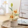 Nuevo adorno de maceta de flor de lirio de ganchillo, flor artificial linda de hilo, adecuado para coche y escritorio, añade ambiente, producto hecho a mano