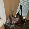 Bolso de mano transfronterizo para mujer, bolso de axila para el día a día, nuevo bolso tipo dumpling simple de verano 2026, bolso de hombro vintage