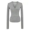 Camiseta Slim Estilo Sexy Americano para Mulheres Outono 2025 Nova Chic Decote em V Camisa de Camada Interna Manga Longa