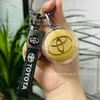Colgante con Logo de Coche Dorado Personalización de LOGO Oro Puro 999 Llavero de Cuero Regalo para Dueño de Coche Tráfico Conducción Colgante Venta al por Mayor