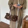 Bolso de hombro minimalista retro europeo y americano, nuevo bolso de mano casual transfronterizo, textura de cuero suave PU, bolso plisado para mujer