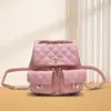 Mochila de piel auténtica estilo Chanel con cadena de diamantes y acabado de caviar de piel de vaca, pequeña y de moda