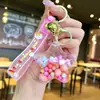Llavero Creativo Serie Océano con Arena Movediza Rellena de Aceite, Lentejuelas y Colgante de Pez Flotante, Adorno de Pez Hada, Pequeño Regalo