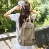 Mochila escolar de gran capacidad estilo bosque para mujeres estudiantes universitarias mochila simple de color sólido de pana japonesa estudiantes de secundaria mochila de viaje