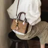 Elegante y moderno bolso pequeño cuadrado con estampado de leopardo, nuevo modelo de principios de otoño 2026, bolso de mano simple y moderno para el trabajo y los desplazamientos