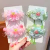 Diadema de tela para el pelo de fresa color macarrón para niñas, accesorio diario para el peinado con borlas y cuentas de colores, diadema suave y linda para niñas