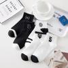 Meias Zhuji preto e branco cor sólida meias femininas verão finas meias invisíveis femininas meias esportivas coreanas masculinas atacado de fábrica