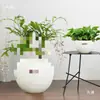 Maceta de plástico imitación piedra tamaño grande para el hogar estilo lujo ligero de alta gama color crema sala de estar oficina planta verde grande forma de bola redonda