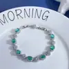Pulsera de Diamantes Ovalados con Encaje de Cuatro Hojas Hueco Brillante, Moda Coreana, Exquisita, Sin Etiqueta