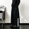 Calça de moletom listrada estilo americano, nova coleção de outono, caimento solto com caimento, bordado color-blocking, calça esportiva casual versátil