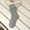 Acheng Home Venta al por mayor Calcetines para mujer Calcetines de algodón sin costuras Calcetines de otoño e invierno hasta la mitad de la pantorrilla Corazón y Lazo Estilo Dulce Coreano Apilados
