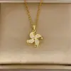 Collar de Molino de Viento Pequeño Giratorio con un Toque de Lujo, Cadena para Clavícula Microincrustada en Cobre, Gargantilla de Trébol de Cuatro Hojas Giratorio para Mujeres, Diseño de Nicho