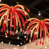 Fuegos artificiales y exhibiciones de globos por el Festival de Medio Otoño y el Día Nacional, decoraciones de escaparates y arreglos de ambiente acogedor para centros comerciales
