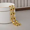 Explosiones Europeas y Americanas Pendientes de Borla Larga de Gotas de Agua Retro Clásico Temperamento de Alta Gama Pendientes Dorados de Amazon Pendientes Mujer