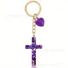 Llavero Cruzado Popular Bola de Pelo Cruzada Colgante de Bolso con Borla de Mariposa Adornos de Moda para Mujer Amuletos Accesorios