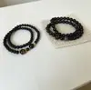Pulsera de cuentas vintage de doble círculo en tono negro con piedra de obsidiana y ojo de tigre, una pulsera versátil de múltiples hilos para uso diario, adecuada tanto para hombres como para mujeres